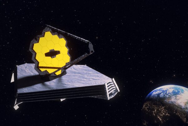 The James Webb Telescope seen in space with the Earth in the background